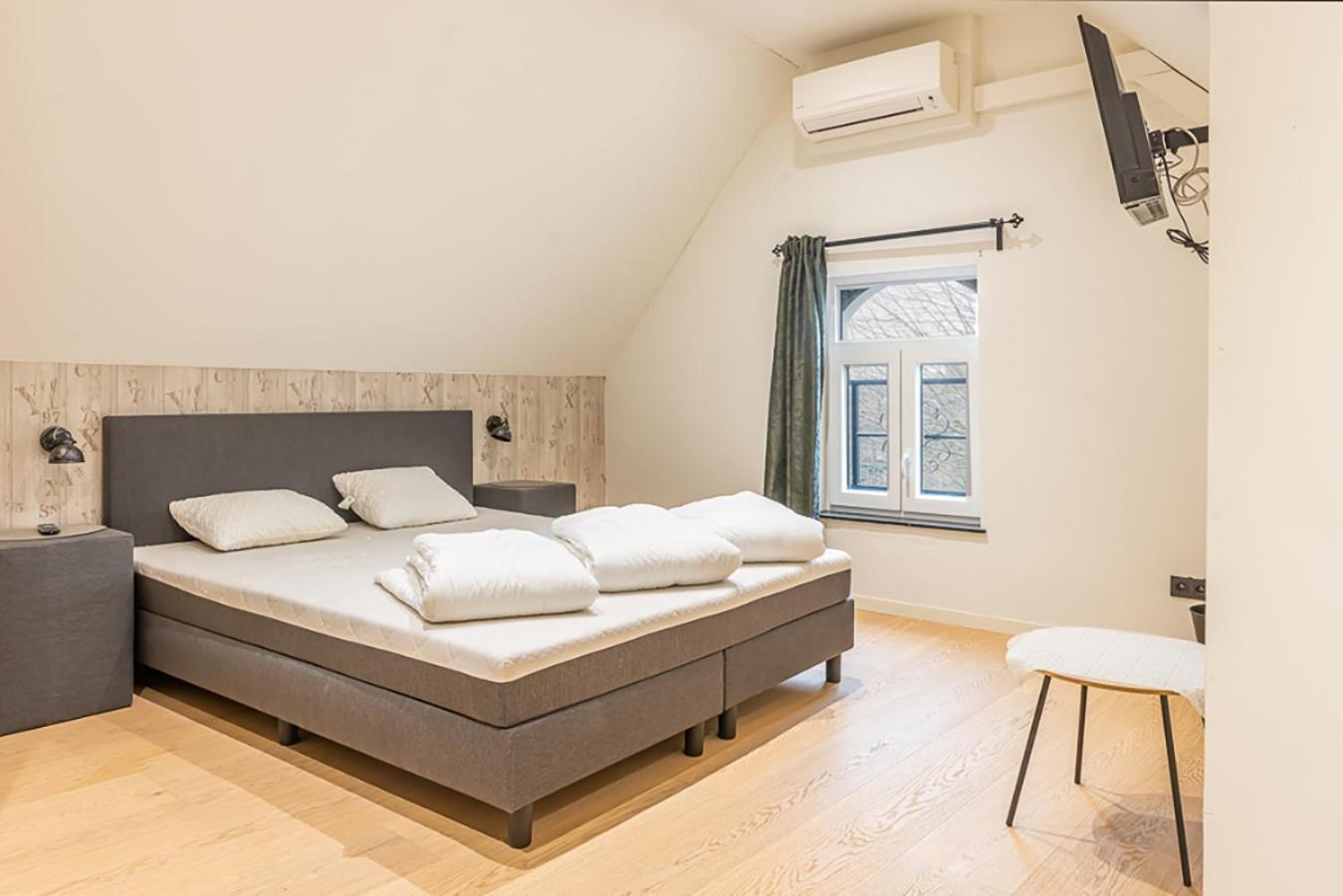 Guesthouses By Hotel Van Eyck Maaseik Bagian luar foto